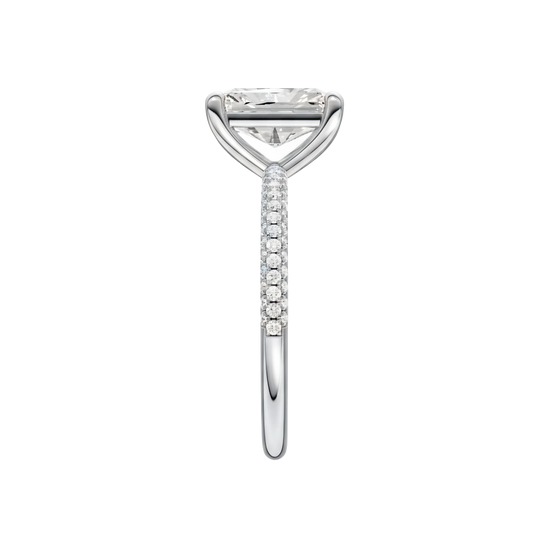 A side view of 14K white gold Amorati Alight radiant diamond solitaire with cathedral setting and pavé band