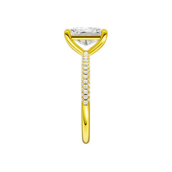 A side view of 14K yellow gold Amorati Alight radiant diamond solitaire with cathedral setting and pavé band