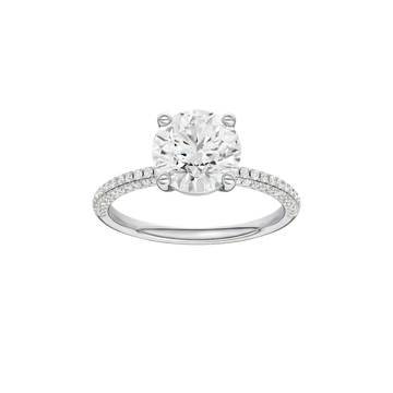 A front view of the Round cut diamond engagement ring in 14k white gold with a pavé diamond band and cathedral setting