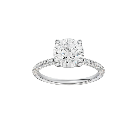 A front view of the Round cut diamond engagement ring in 14k white gold with a pavé diamond band and cathedral setting