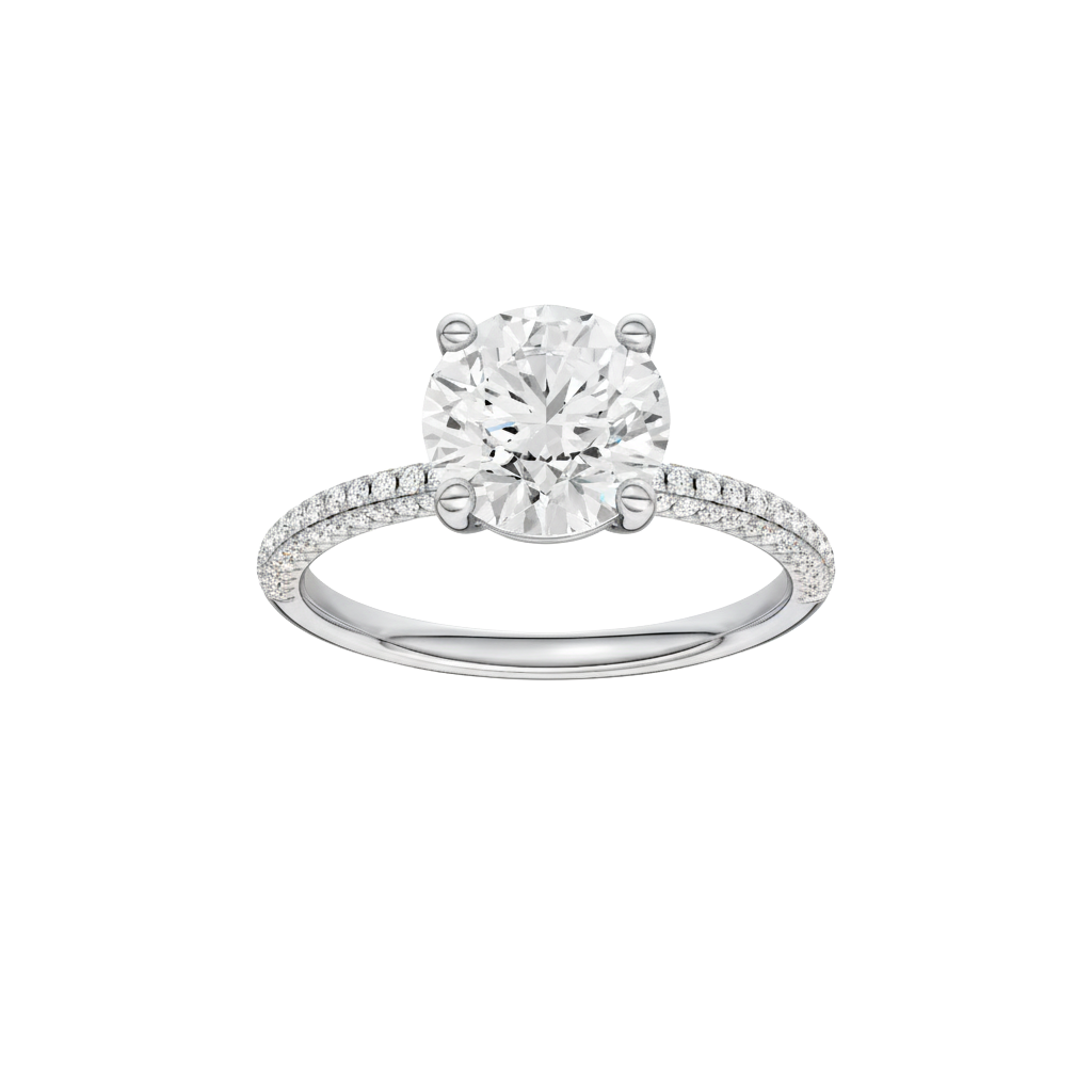 A front view of the Round cut diamond engagement ring in platinum with a pavé diamond band and cathedral setting