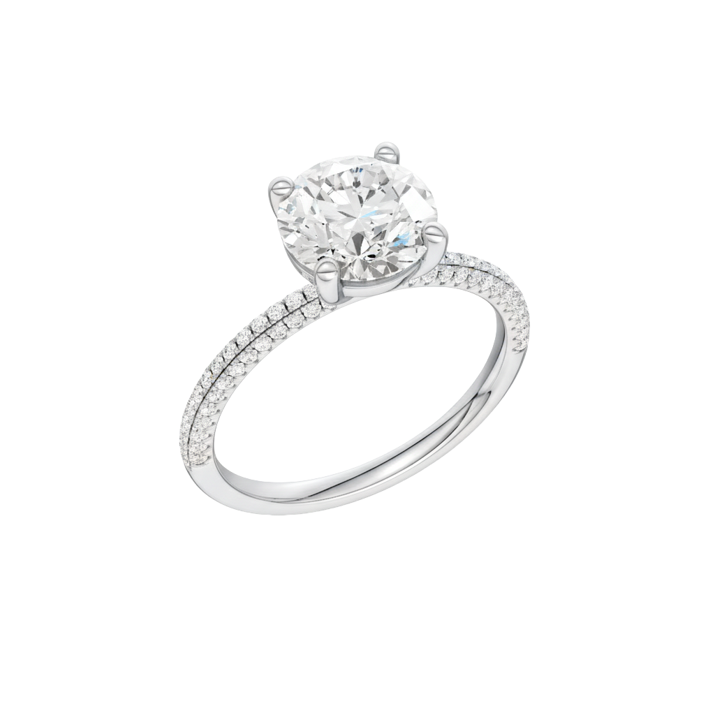 A three-quarter view of the Round cut diamond engagement ring in platinum  with a pavé diamond band and cathedral setting