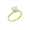 A three-quarter view of the Round cut diamond engagement ring in 14k yellow gold with a pavé diamond band and cathedral setting
