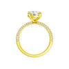 A profile view of the Round cut diamond engagement ring in 14k yellow gold with a pavé diamond band and cathedral setting