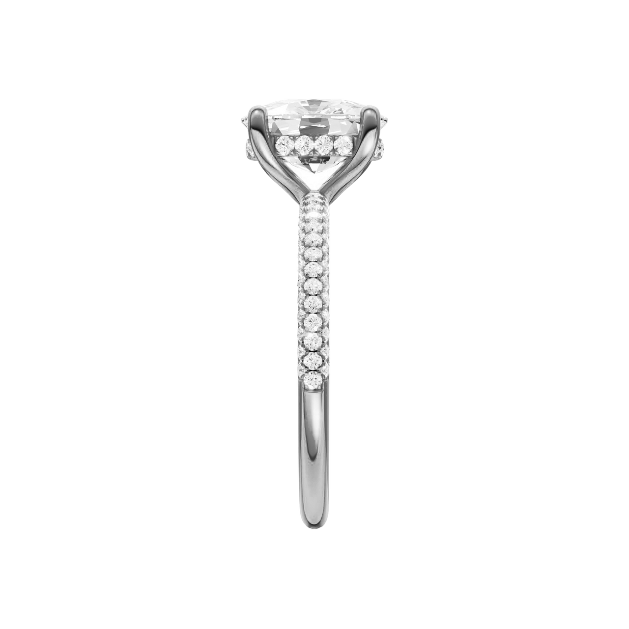 A side view of the Elongated cushion cut diamond engagement ring in platinum with a pavé diamond band and cathedral setting