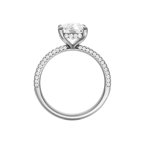 A front view of the Elongated cushion cut diamond engagement ring in platinum with a pavé diamond band and cathedral setting