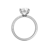 A front view of the Elongated cushion cut diamond engagement ring in 14k white gold with a pavé diamond band and cathedral setting