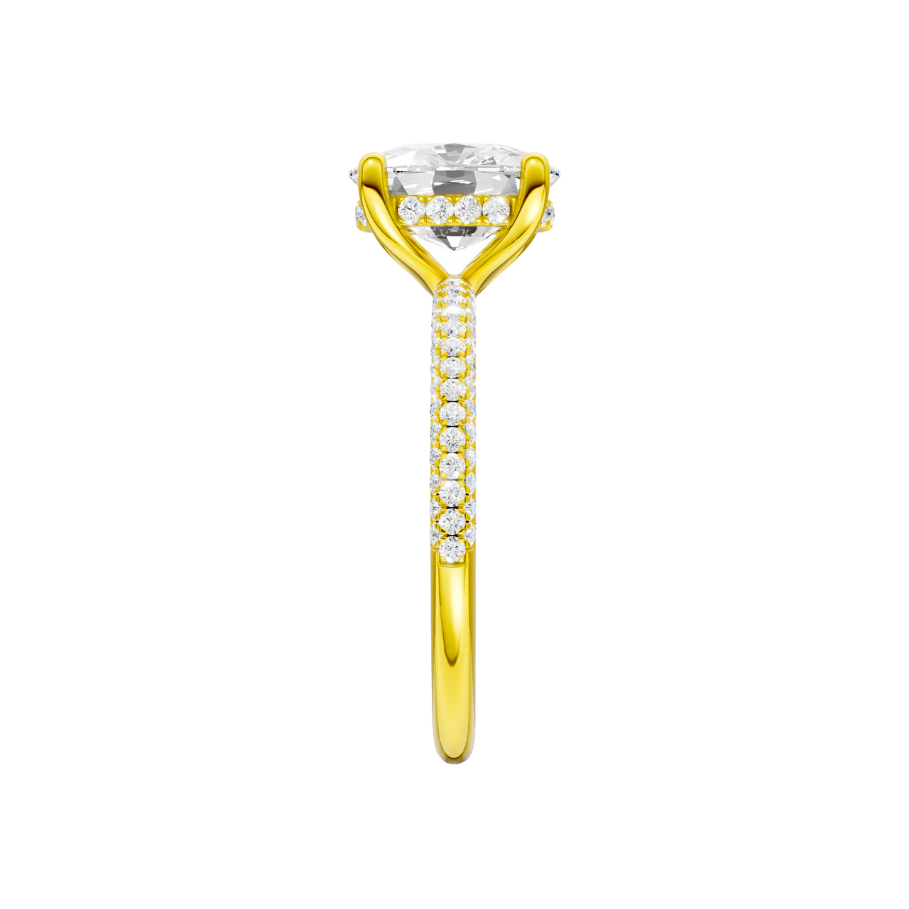 A side view of the Elongated cushion cut diamond engagement ring in 14k yellow gold with a pavé diamond band and cathedral setting