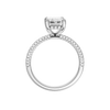 A profile view of the Emerald cut diamond engagement ring in platinum with a pavé diamond band and cathedral setting