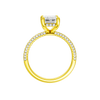 A profile view of the Emerald cut diamond engagement ring in 14k yellow gold with a pavé diamond band and cathedral setting