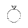 A profile view of the Marquise cut diamond engagement ring in 14k white gold with a pavé diamond band and cathedral setting
