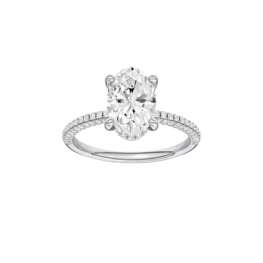 A front view of the Oval cut diamond engagement ring in 14k white gold with a pavé diamond band and cathedral setting