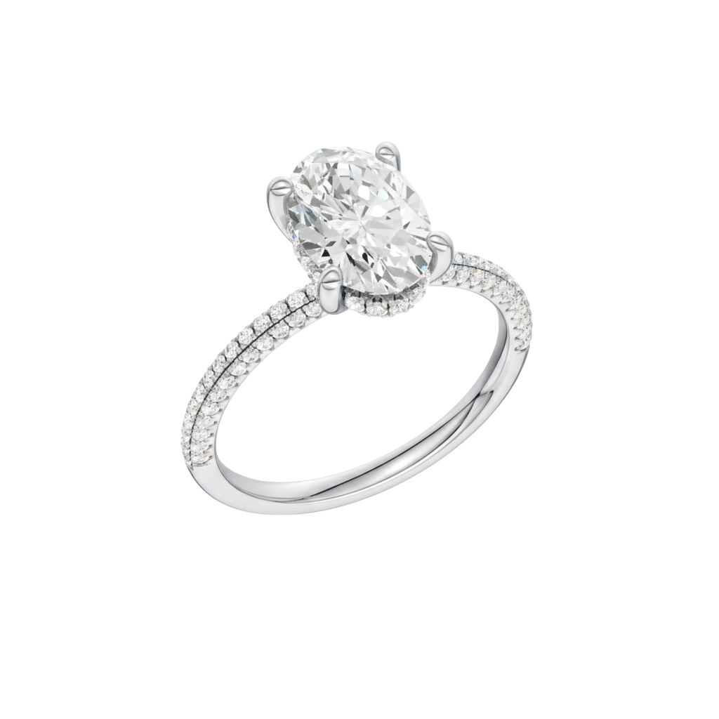 A three-quarter view of the Oval cut diamond engagement ring in platinum with a pavé diamond band and cathedral setting