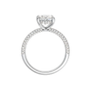 A profile view of the Oval cut diamond engagement ring in 14k white gold with a pavé diamond band and cathedral setting