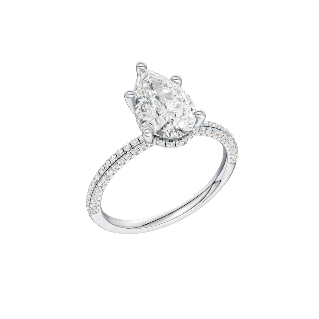 A three-quarter view of the Pear cut diamond engagement ring in platinum with a pavé diamond band and cathedral setting