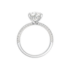 A profile view of the Pear cut diamond engagement ring in platinum with a pavé diamond band and cathedral setting