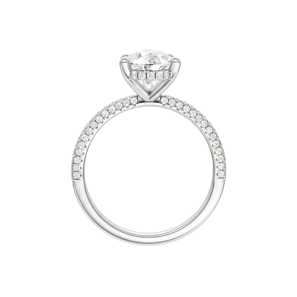 A profile view of the Pear cut diamond engagement ring in 14k white gold with a pavé diamond band and cathedral setting