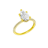 A three-quarter view of the Pear cut diamond engagement ring in 14k yellow gold with a pavé diamond band and cathedral setting