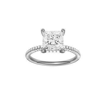 A front view of the Princess cut diamond engagement ring in 14k white gold with a pavé diamond band and cathedral setting