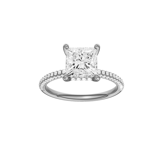 A front view of the Princess cut diamond engagement ring in 14k white gold with a pavé diamond band and cathedral setting
