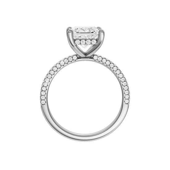 A profile view of the Princess cut diamond engagement ring in 14k white gold with a pavé diamond band and cathedral setting