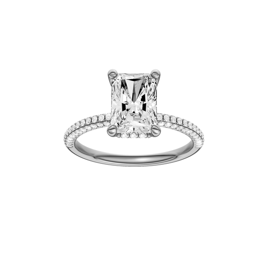 A front view of the Radiant cut diamond engagement ring in 14k white gold with a pavé diamond band and cathedral setting