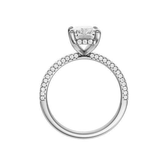 A profile view of the Radiant cut diamond engagement ring in platinum with a pavé diamond band and cathedral setting