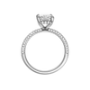A profile view of the Radiant cut diamond engagement ring in platinum with a pavé diamond band and cathedral setting