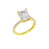 A three-quarter view of the Radiant cut diamond engagement ring in 14k yellow gold with a pavé diamond band and cathedral setting