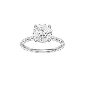 A front view of the Round cut diamond engagement ring in 14k white gold with a pavé diamond band and cathedral setting