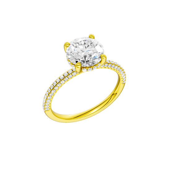 A three-quarter view of the Round cut diamond engagement ring in 14k yellow gold with a pavé diamond band and cathedral setting