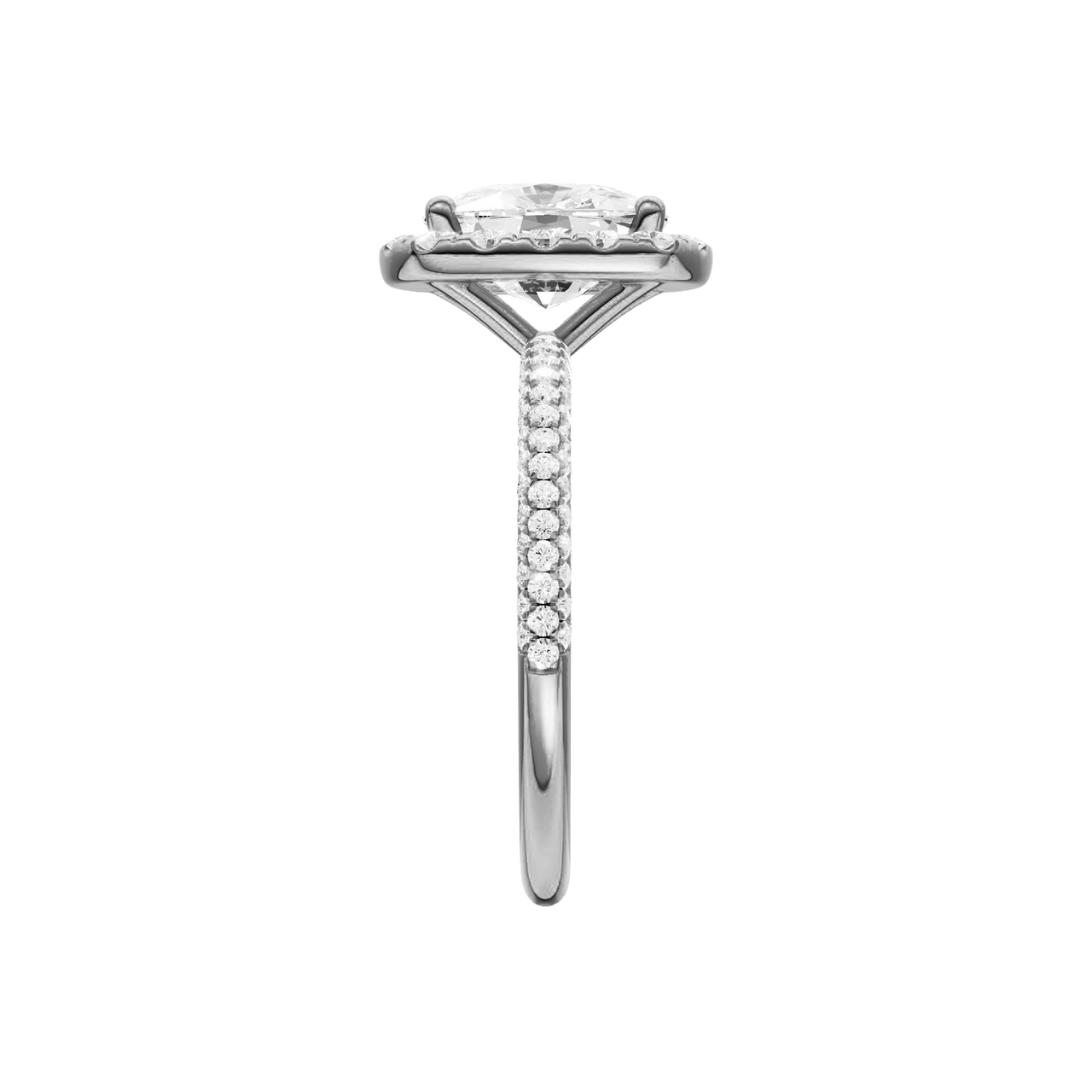 A side view of the Elongated cushion cut diamond engagement ring in platinum with a pavé diamond band and solitaire setting