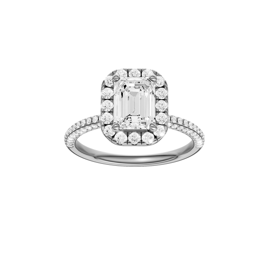 A front view of the Emerald cut diamond engagement ring in 14k white gold with a pavé diamond band and solitaire setting