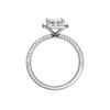 A profile view of the Emerald cut diamond engagement ring in 14k white gold with a pavé diamond band and solitaire setting