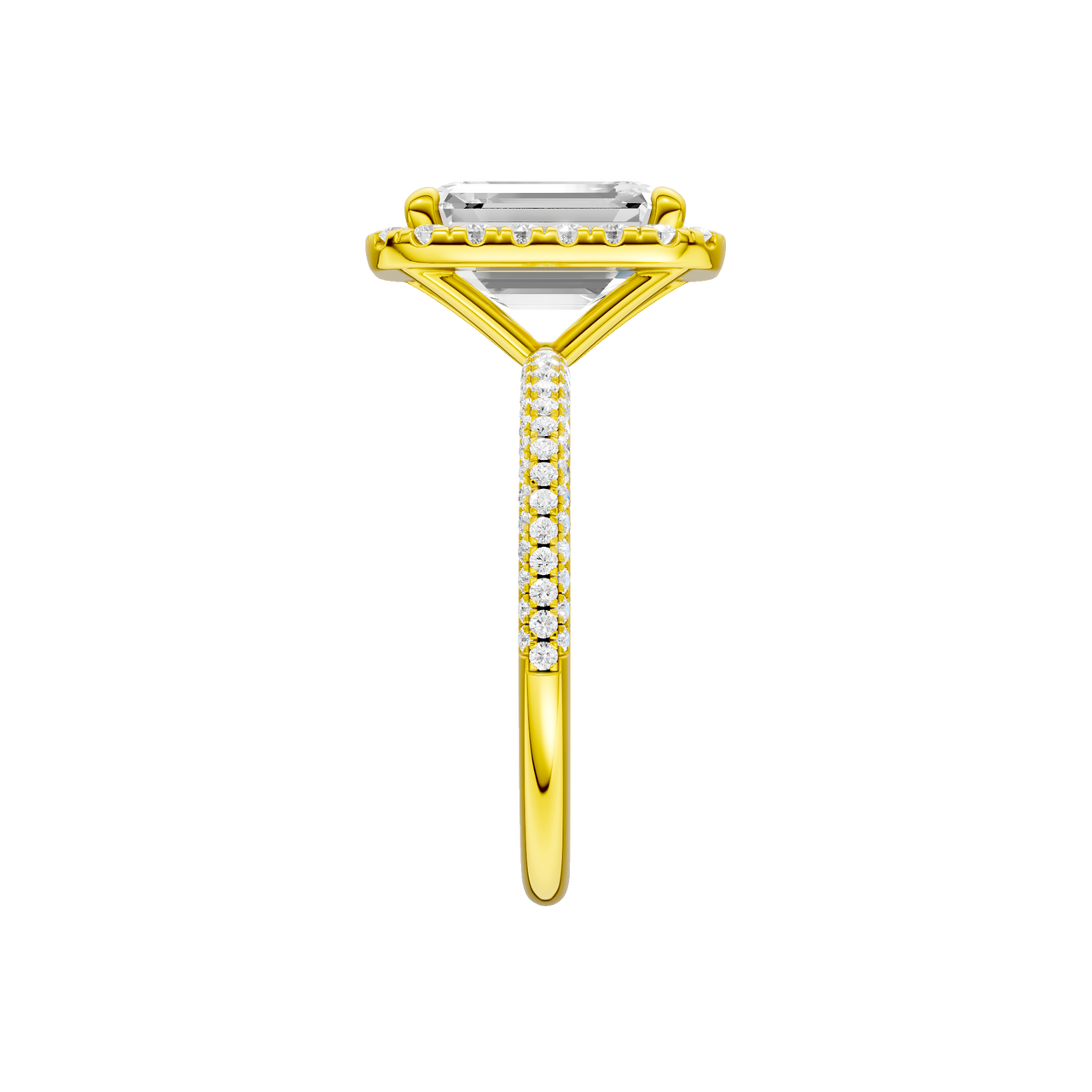 A side view of the Emerald cut diamond engagement ring in 14k yellow gold with a pavé diamond band and solitaire setting
