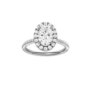 A front view of the oval cut diamond engagement ring in 14k white gold with a pavé diamond band and solitaire setting
