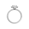 A profile  view of the oval cut diamond engagement ring in 14k white gold with a pavé diamond band and solitaire setting