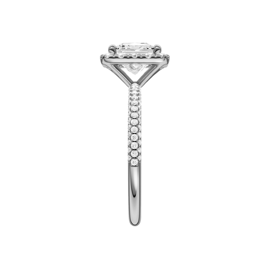 A side view of the Princess cut diamond engagement ring in 14k white gold with a pavé diamond band and solitaire setting
