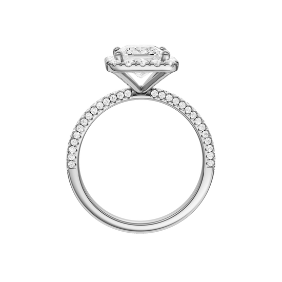 A profile view of the Princess cut diamond engagement ring in 14k white gold with a pavé diamond band and solitaire setting