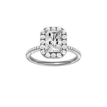 A front view of the Radiant cut diamond engagement ring in 14k white gold with a pavé diamond band and solitaire setting