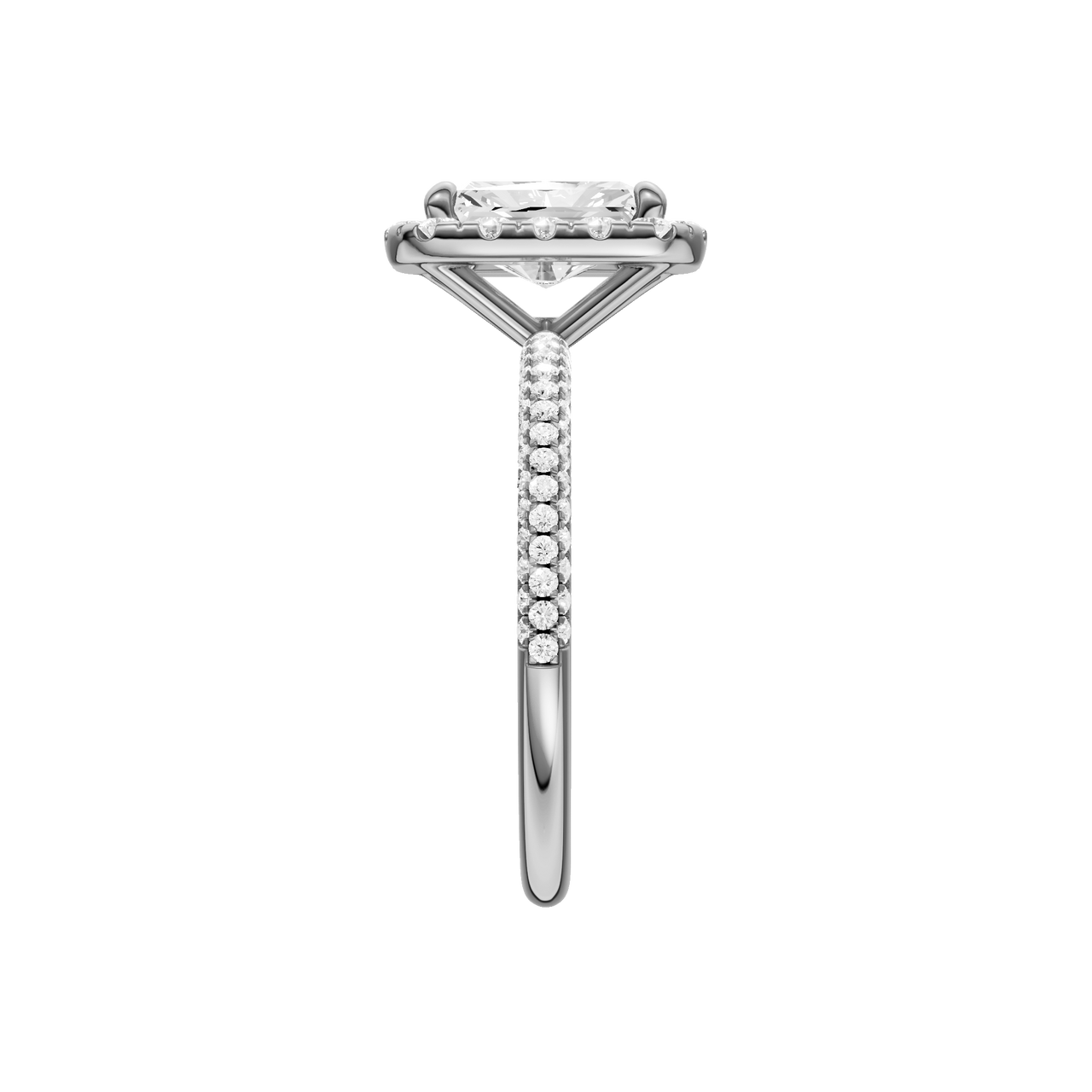 A side view of the Radiant cut diamond engagement ring in 14k white gold with a pavé diamond band and solitaire setting