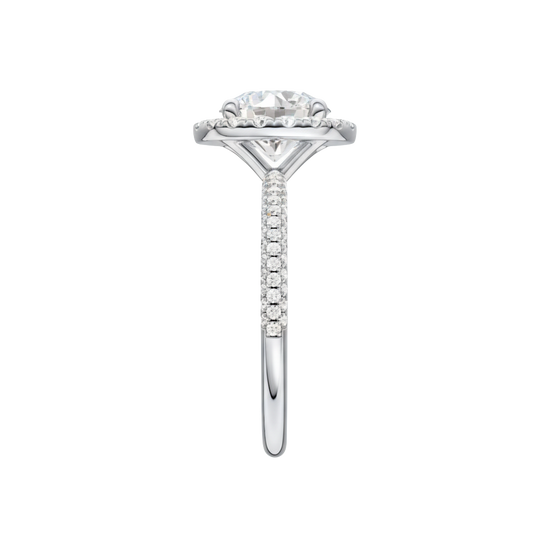 A side view of the Round cut diamond engagement ring in 14k white gold with a pavé diamond band and solitaire setting