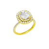 A three-quarter view of the Elongated cushion cut diamond engagement ring in 14k yellow gold with a pavé diamond band and solitaire setting