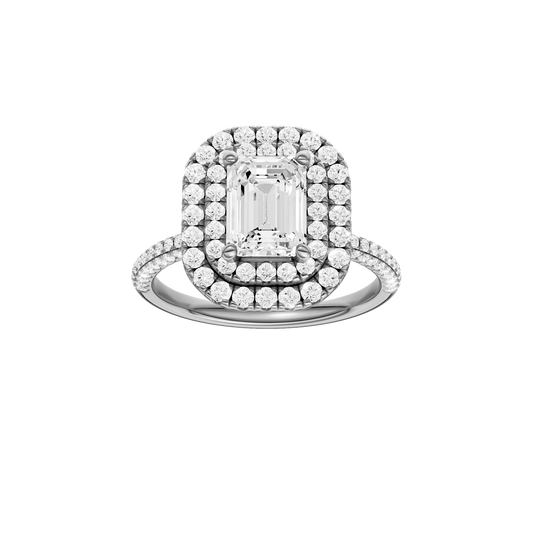 A front view of the Emerald cut diamond engagement ring in 14k white gold with a pavé diamond band and solitaire setting