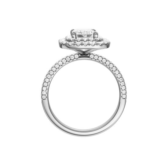 A profile view of the Emerald cut diamond engagement ring in platinum with a pavé diamond band and solitaire setting