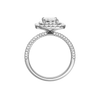 A profile view of the Emerald cut diamond engagement ring in 14k white gold with a pavé diamond band and solitaire setting