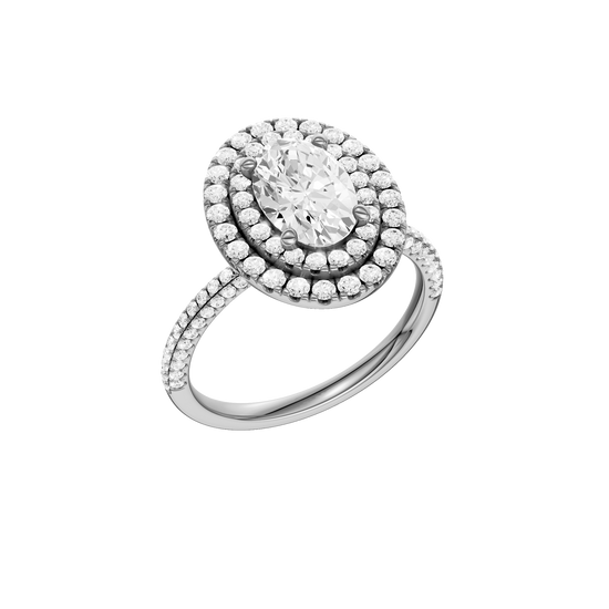 A three-quarter view of the Oval cut diamond engagement ring in 14k white gold with a pavé diamond band and solitaire setting