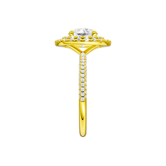 A side view of the Round cut diamond engagement ring in 14k yellow gold with a pavé diamond band and solitaire setting