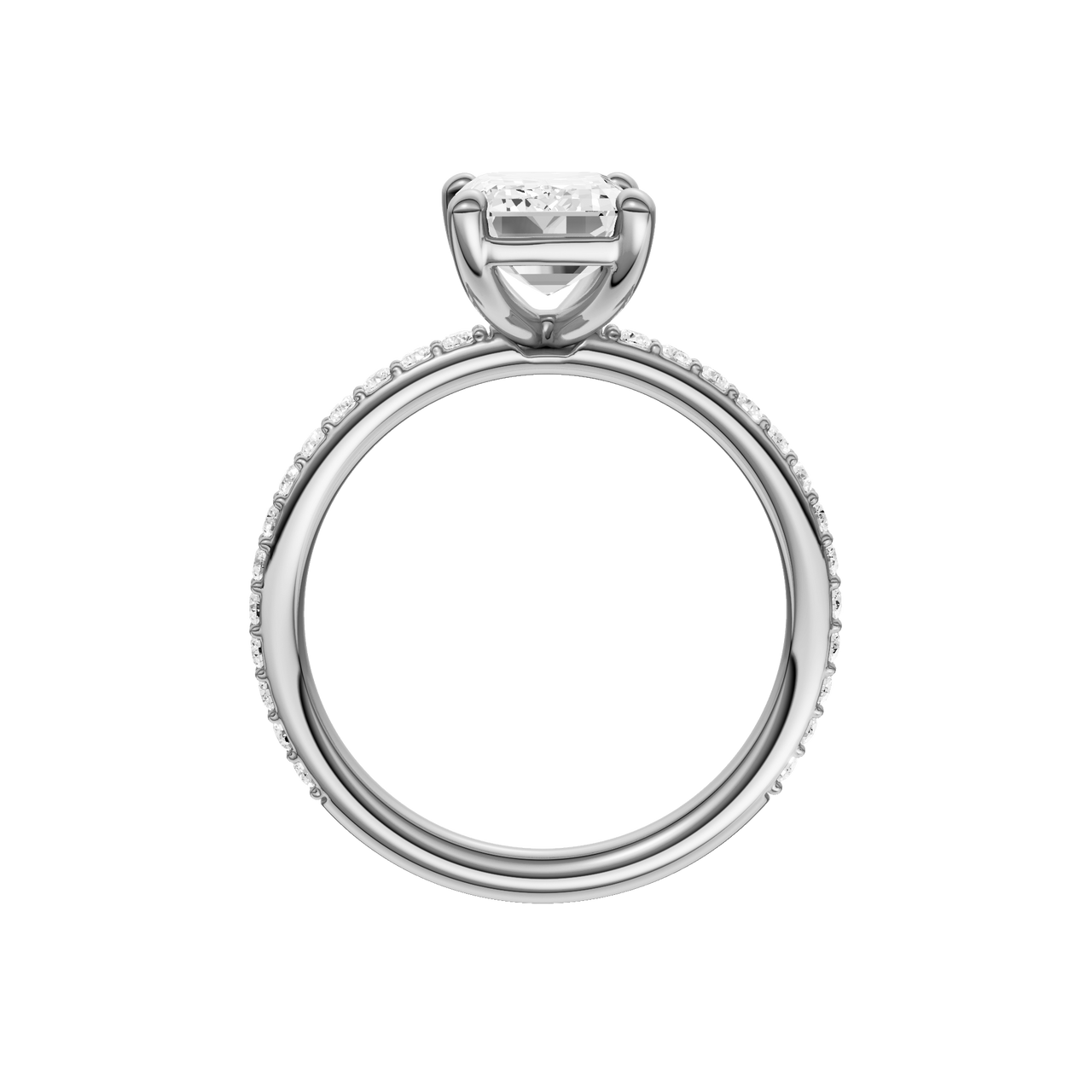 A profile view of the Emerald cut diamond engagement ring in platinum with a prong diamond band and cathedral setting