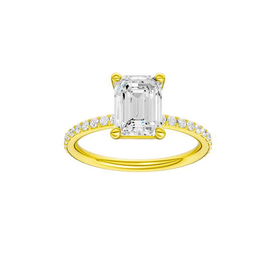 A front view of the Emerald cut diamond engagement ring in 14k yellow gold with a prong diamond band and cathedral setting